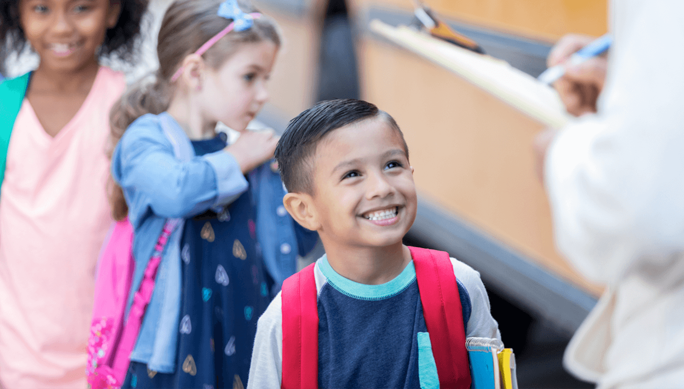 Children boarding a school bus